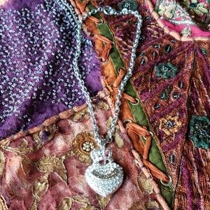 Juicy rhinestone necklace. Measures at 17 inches